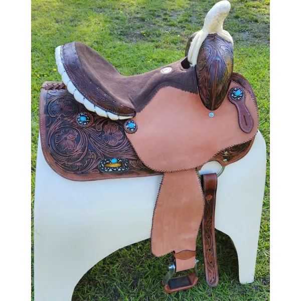 14", 15", 16" Double T barrel saddle with silver laced tan rawhide cantle, dot border on rough out fenders and jockeys.