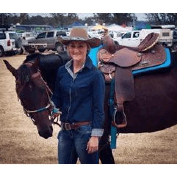 14", 15", 16" Double T barrel saddle with silver laced tan rawhide cantle, dot border on rough out fenders and jockeys.